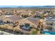 Spacious backyard featuring a patio, desert landscaping, and neighborhood views at 1484 Midnight Cowboy Ct, Las Vegas, NV 89110
