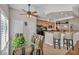 The dining area features matching table and chairs and provides an open view into the kitchen and living areas at 1484 Midnight Cowboy Ct, Las Vegas, NV 89110