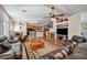 Large living room featuring an open layout, hardwood floors, and a fireplace at 1484 Midnight Cowboy Ct, Las Vegas, NV 89110