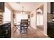 Open dining area with modern furniture and a window allowing lots of natural light at 2115 Saint Paul Way, Las Vegas, NV 89104