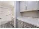 Bathroom showcasing shower/tub, vanity, and extra cabinet space at 220 Mission Catalina Ln # 202, Las Vegas, NV 89107
