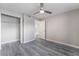 Bedroom features ceiling fan, wood look floors and convenient closet at 220 Mission Catalina Ln # 202, Las Vegas, NV 89107