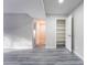 Living room with gray floors, a closet, and doorway to the rest of the home at 220 Mission Catalina Ln # 202, Las Vegas, NV 89107