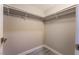 Walk-in closet with neutral walls and shelving at 220 Mission Catalina Ln # 202, Las Vegas, NV 89107