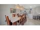 Tastefully decorated dining area with a modern pendant light, situated near the well-equipped kitchen at 2210 Shadow Canyon Dr, Henderson, NV 89044