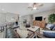 Inviting living room featuring tile flooring, ceiling fan, and comfortable seating arrangement at 2210 Shadow Canyon Dr, Henderson, NV 89044