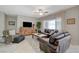 Inviting living room with comfortable seating, natural light, and stylish decor, perfect for relaxation at 2210 Shadow Canyon Dr, Henderson, NV 89044