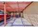 Covered patio and parking with a lattice cover that creates an interesting shadow effect at 2405 Pickwick Dr # 55, Henderson, NV 89014