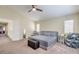 Spacious primary bedroom with vaulted ceiling, soft carpet, and lots of natural light at 2865 Vigilante Ct, North Las Vegas, NV 89081