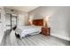 Spacious bedroom with hardwood floors and ample lighting at 30 Strada Di Villaggio # 143, Henderson, NV 89011