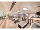 Well-equipped fitness center offering modern machines, spacious layout, and mirrored walls for a comprehensive workout experience at 30 Strada Di Villaggio # 143, Henderson, NV 89011