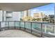 Spacious balcony features glass railings and gorgeous city views at 322 Karen Ave # 201, Las Vegas, NV 89109