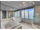 Luxurious bathroom with jacuzzi tub, walk-in shower, and double vanity at 322 Karen Ave # 201, Las Vegas, NV 89109