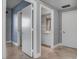 Hallway with access to bathroom, walk-in closet, and other rooms at 322 Karen Ave # 201, Las Vegas, NV 89109