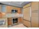Well-appointed kitchen featuring stainless steel appliances and stylish light wood cabinetry at 322 Karen Ave # 201, Las Vegas, NV 89109