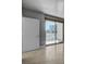 Bright living room with sliding glass doors leading to balcony at 322 Karen Ave # 201, Las Vegas, NV 89109