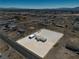This property features a desert home with a spacious lot and functional detached structure for convenience at 3581 W Dyer Rd, Pahrump, NV 89048