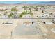 A sprawling property in a rural area featuring a spacious lot and functional detached garage at 3581 W Dyer Rd, Pahrump, NV 89048