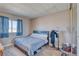 Comfortable bedroom with natural light and neutral decor at 3581 W Dyer Rd, Pahrump, NV 89048