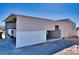 Detached garage providing secure parking and additional storage space at 3581 W Dyer Rd, Pahrump, NV 89048