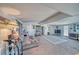 Comfortable living room with a large sofa, decorative items, and ample natural light at 3581 W Dyer Rd, Pahrump, NV 89048