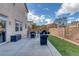 This backyard is perfect for relaxing and features a patio, BBQ, and artificial turf at 3964 Irvin Ave, Las Vegas, NV 89141