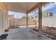 Covered backyard patio with block wall, offering space for outdoor enjoyment at 4068 Pistachio Nut Ave, Las Vegas, NV 89115