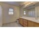 Practical bathroom featuring a vanity with ample storage and a shower-tub combination, perfect for Gathering use at 4068 Pistachio Nut Ave, Las Vegas, NV 89115