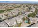Picturesque community aerial view featuring lush landscaping, a golf course, and well-maintained homes at 420 Pinnacle Heights Ln, Las Vegas, NV 89144