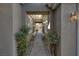 Inviting walkway to the front door with landscaped greenery and a charming gate at 420 Pinnacle Heights Ln, Las Vegas, NV 89144