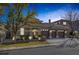 Charming home with a three-car garage and mature trees in the front yard at 420 Pinnacle Heights Ln, Las Vegas, NV 89144