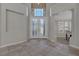 Bright entryway featuring tile flooring, high ceilings, and decorative glass front doors at 420 Pinnacle Heights Ln, Las Vegas, NV 89144
