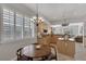 Eat-in kitchen featuring light wood cabinets, granite countertops and a breakfast nook at 420 Pinnacle Heights Ln, Las Vegas, NV 89144