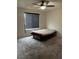 Bedroom featuring a ceiling fan and carpeted flooring at 4381 Fire Glow Ave, North Las Vegas, NV 89084