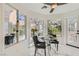 Charming breakfast nook with marble floors, large windows offering natural light, and seating for casual dining at 4961 Tierra Del Sol Dr, Las Vegas, NV 89113