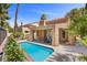 Private backyard pool with a covered patio, perfect for outdoor relaxation and entertaining at 4961 Tierra Del Sol Dr, Las Vegas, NV 89113