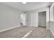 Bright bedroom boasts large closet, neutral walls, and a plush carpet, creating a serene space at 5009 Indian River Dr # 153, Las Vegas, NV 89103