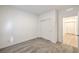 Neutral bedroom with carpet, closet with sliding doors, base trim, and white walls at 600 N Carriage Hill Dr # 1143, Las Vegas, NV 89138