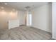 Cozy loft area features neutral carpet, white walls, base trim, and two doors at 600 N Carriage Hill Dr # 1143, Las Vegas, NV 89138