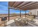 Outdoor picnic area offering scenic views, complete with barbecue grills and shaded seating for gatherings at 600 N Carriage Hill Dr # 1143, Las Vegas, NV 89138