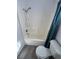 Bright bathroom featuring a bathtub, toilet, shower head, and modern fixtures at 6104 Hillside Bloom Ct # 201, Las Vegas, NV 89130