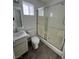 Clean bathroom featuring a shower over bath, a vanity with a sink, and a toilet at 6104 Hillside Bloom Ct # 201, Las Vegas, NV 89130