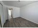 Well-lit bedroom with wood floors and neutral walls at 6104 Hillside Bloom Ct # 201, Las Vegas, NV 89130