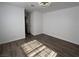 Clean bedroom with vinyl plank flooring, fresh paint, and modern ceiling fan at 6104 Hillside Bloom Ct # 201, Las Vegas, NV 89130