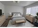 Serene bedroom features neutral tones, soft lighting, and a comfortable king-size bed at 6104 Hillside Bloom Ct # 201, Las Vegas, NV 89130