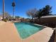 Inviting community pool with clear blue water, surrounded by well-maintained landscaping at 6104 Hillside Bloom Ct # 201, Las Vegas, NV 89130
