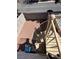 An outdoor spiral staircase leads to a private balcony overlooking the backyard and neighborhood street at 6104 Hillside Bloom Ct # 201, Las Vegas, NV 89130