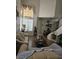 Comfortable living room features tile floors, high ceilings, and staircase at 6624 Socorro Dr, Las Vegas, NV 89108