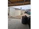Backyard with a shed, partial view of an advertising sign and some trash bags at 6624 Socorro Dr, Las Vegas, NV 89108