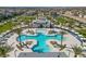 Aerial view of community pool and recreation area, showcasing a resort-style living and lush landscaping at 6952 Midnight Bronze St, North Las Vegas, NV 89086